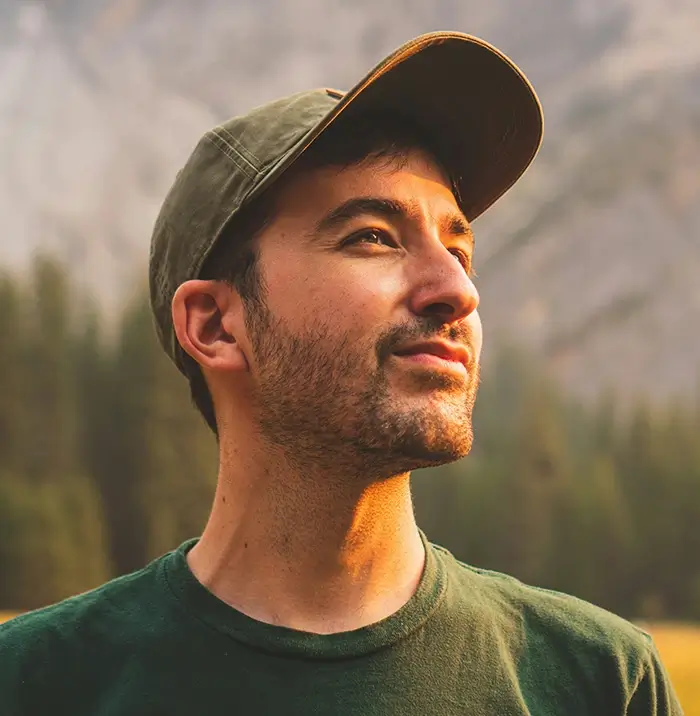 Peaceful man standing outside
