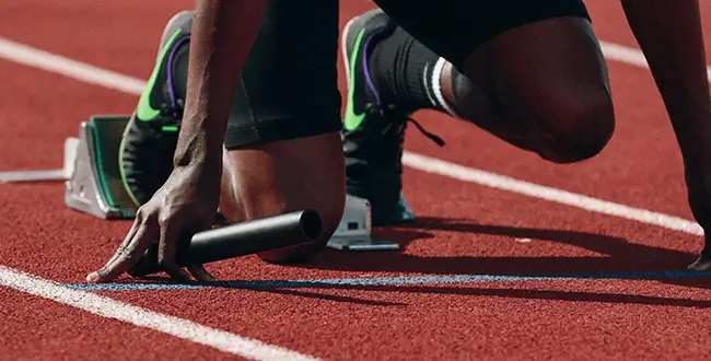 Athlete preparing for relay race