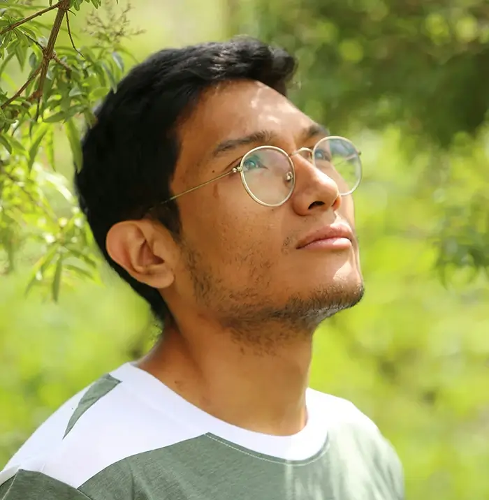 Thoughtful man standing outside