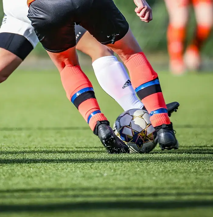 Athletes playing soccer